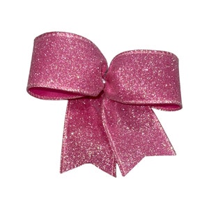 May include: A pink glitter bow with a large center loop and two smaller loops on either side.