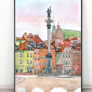Puede incluir: Impresión en acuarela de un paisaje urbano europeo con edificios coloridos y tejados de tejas rojas. Una columna alta con una estatua es central. La obra de arte está enmarcada en un borde negro.