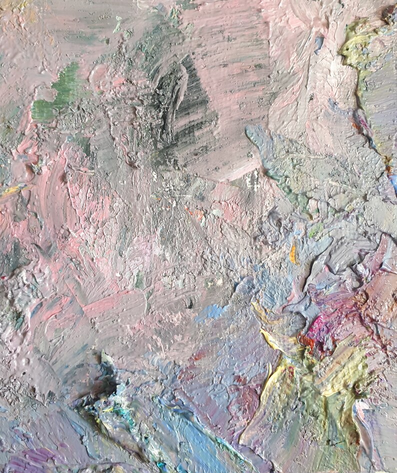 May include: Close-up of a textured, abstract painting with shades of pink, grey, blue, and yellow. The paint is thick and layered, creating a dynamic and textured surface.