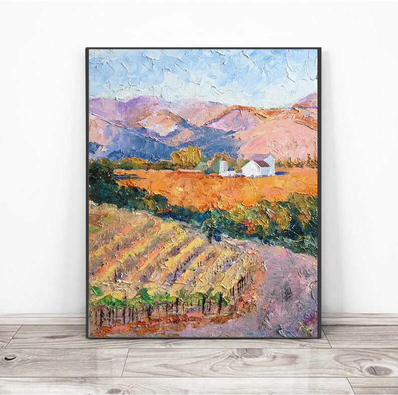 May include: A painting depicting a vineyard landscape with a white farmhouse in the distance. The vineyard is in the foreground, with rows of grapevines and a dirt road leading to the farmhouse. The hills in the background are painted in shades of purple, pink, and orange.