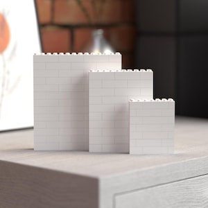 Set of three blank white building brick photo blocks in varying sizes, ready for personalized customization. Ideal as creative DIY gifts or decorative accents, these blocks allow you to showcase your favorite photos, artwork, or messages, making them perfect for special occasions, holidays, or everyday home decor.