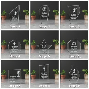 K&ouml;nnte beinhalten: Neun verschiedene Glas-Award-Formen mit anpassbarem Text f&uuml;r jedes Symbol, jeden Namen, jede Gelegenheit und jedes Datum. Die Formen umfassen einen Stern, eine Troph&auml;e, einen L&auml;ufer, einen Fu&szlig;ballspieler, einen Basketball, eine Fackel und eine geometrische Form.