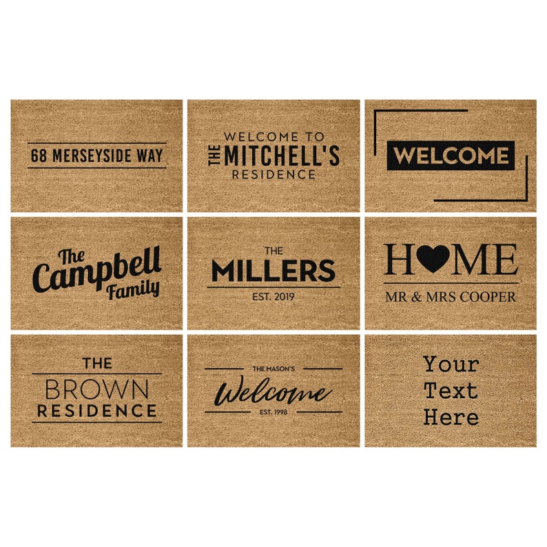 May include: Nine different doormats with various welcome messages and family names. The doormats are brown and have black text. The doormats include the following text: 68 Merseyside Way, Welcome to The Mitchell's Residence, Welcome, The Campbell Family, The Millers Est. 2019, Home Mr & Mrs Cooper, The Brown Residence, The Mason's Welcome Est. 1998, Your Text Here.