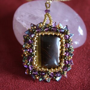 Pendant with cabochon Tigereye