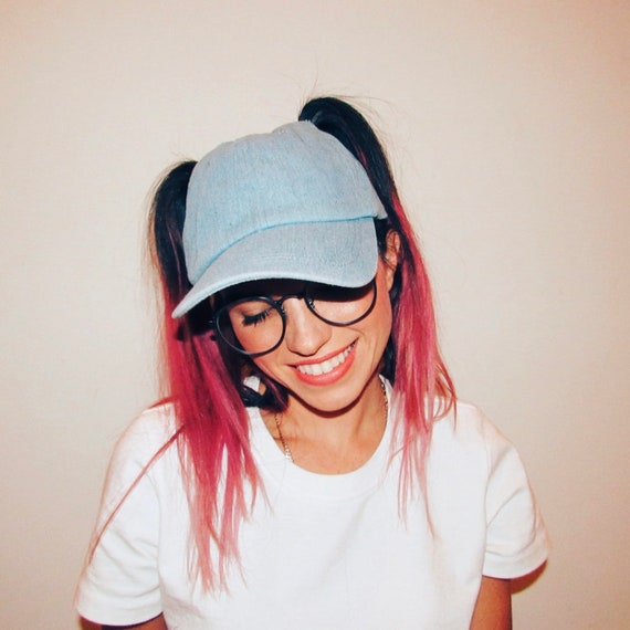 hat with pigtail holes