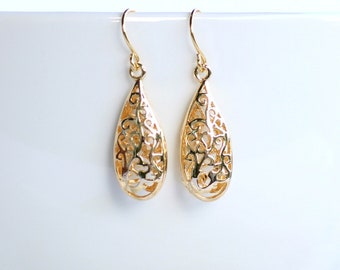 Boucles d'oreilles en plaqué or pendantes creuses. Boucles d'oreilles bohèmes. cadeau pour vous