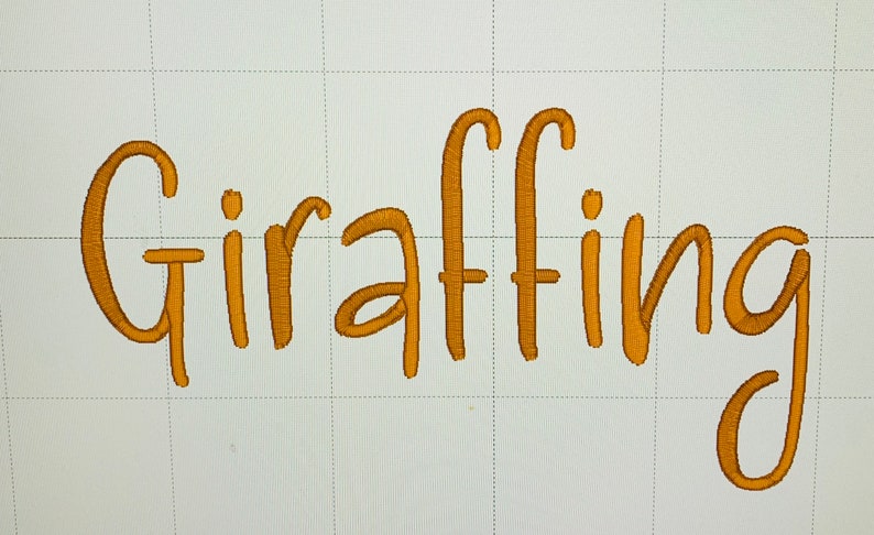 May include: A gold embroidered word "Giraffing" on a white background.