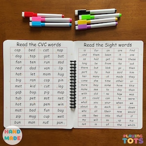 May include: A spiral-bound educational book with CVC and sight words, accompanied by colorful markers. The book features lists of words for early reading practice. The words are printed in a clear, easy-to-read font.