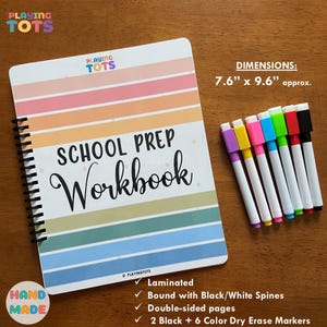 May include: A School Prep Workbook with a colorful striped design, measuring approximately 7.6" x 9.6". The workbook is spiral-bound and includes 8 dry-erase markers in various colors. The cover reads "SCHOOL PREP Workbook".