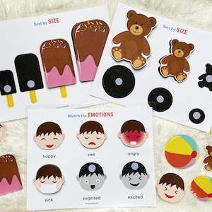 Grab this Busy Book printable to make quiet time activity for your Toddler. This learning binder includes activity worksheets to home school and get your kid ready for Preschool.