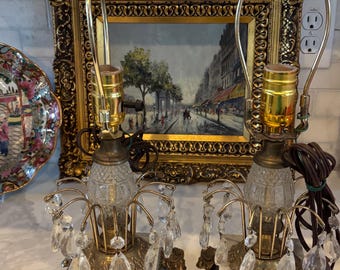 Pair of vintage Hollywood Regency table lamps with crystals, marble accents and a brass base 16” tall