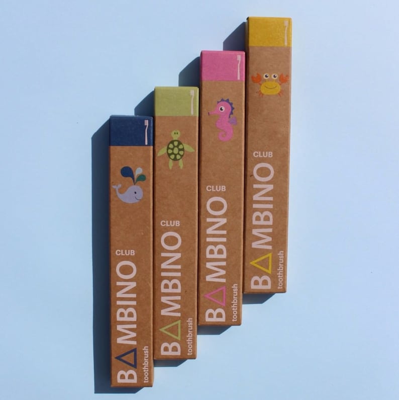 May include: Five cardboard boxes with colorful illustrations of sea creatures and the text "CLUB BAMBINOToothbrush" on each box.