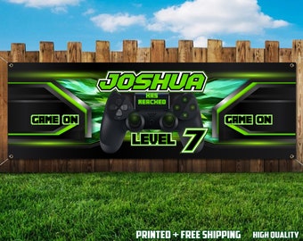 May include: A black and green banner with the text "JOSHUA HAS REACHED LEVEL 7" and a video game controller graphic. The banner also has the text "GAME ON" on each side of the controller graphic.