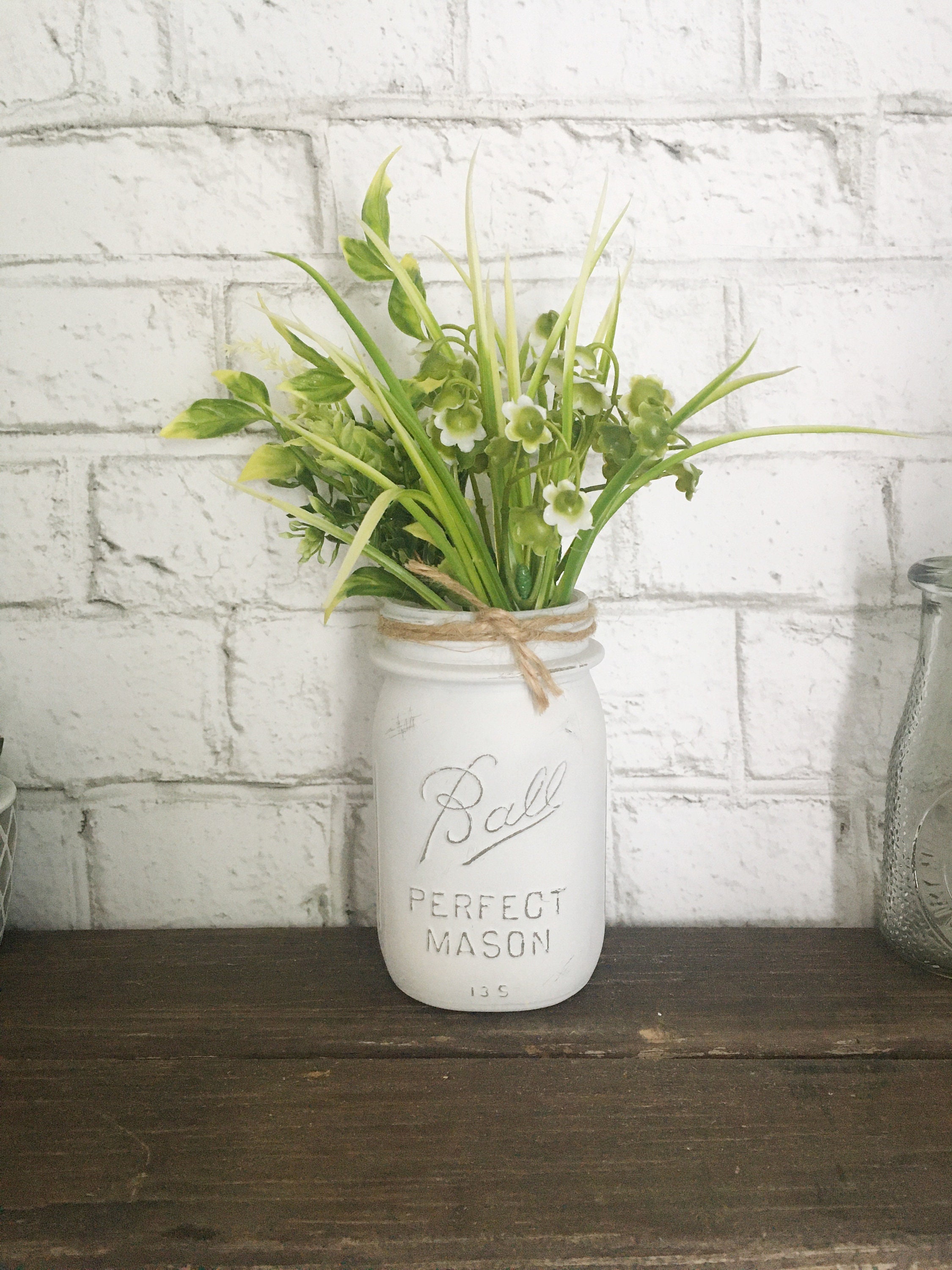 All white arrangement on large mason jars. Natural Wonders Photography