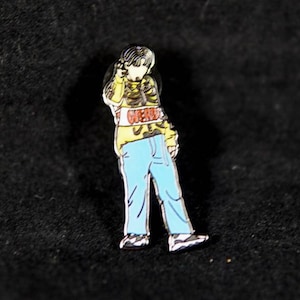 BTS Jungkook Jk wearing a Loverboy sweater while performing Dionysus at one of their Comebacks Hard Enamel Pin