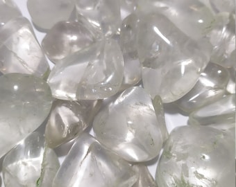 Tumbled hyaline quartz and tumbled hyaline quartz with chlorite inclusions natural chakra crystal therapy Minerals