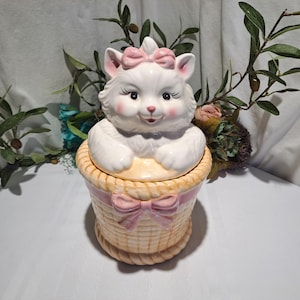 Vintage White Kitten With Pink Bow In Weave Basket With Pink Ribbon Ceramic Cookie Jar Made In Taiwan Distributed By Montgomery Ward & Co.