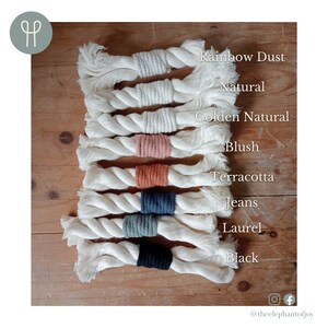 An image of 8 pieces of cream cotton rope, each wrapped with a different colour cotton cord on a wooden background. Text is overlaying the image against each piece of rope, listing the accent colours available to choose from.