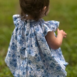 Petit Bebe Baby Girls Blue LIberty Floral Smocked Bishop Romper main image 1