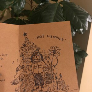 パーソナライズされたクリスマスカードのインクイラスト