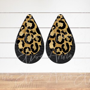May include: A pair of black teardrop-shaped earrings with a gold and black leopard print design.