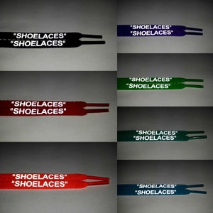 May include: Six pairs of shoelaces in different colors, each with the text "SHOELACES" printed on them in white. The shoelaces are arranged in two rows of three.