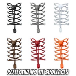 Könnte beinhalten: Sechs Paare reflektierender, schnürsenkelloser Schnürsenkel in verschiedenen Farben: Schwarz, Grau, Weiß, Braun, Rot und Orange. Jedes Paar hat einen Knebel und einen Kordelverschluss. Der Text "REFLECTIVE NO TIE SHOELACES" ist unten zu sehen.