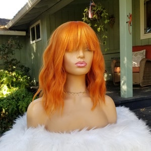 Pale orange wig deals