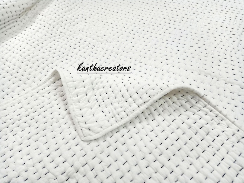 This is a surical cotton quilt in Hand stitch black threads, this luxury quilt are lightweight, reversible & eco-friendly.