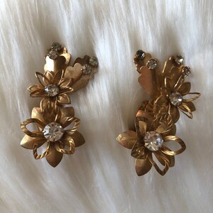 Unique vintage clip on gold earrings