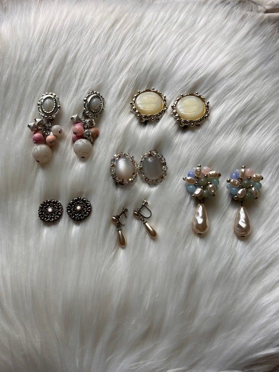 Six pairs of vintage clip on earrings