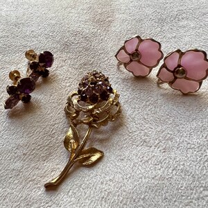Vintage brooch with two sets of vintage earrings