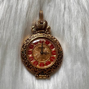 Mondaine Jewels vintage gold pocket watch with red and green jewels
