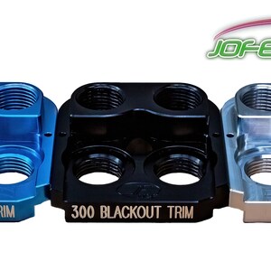 May include: Three 300 Blackout Trim tools, one blue, one black, and one silver, with the text "300 BLACKOUT TRIM" on each.