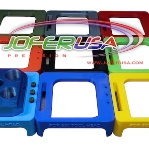 May include: A set of nine colorful plastic tool holders for a 650 tool head. The holders are in various colors, including red, green, blue, yellow, black, and gray. The holders are labeled "FOR 650 TOOL HEAD".