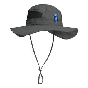 May include: A gray sun hat with a wide brim and a black mesh vent. The hat features a chin strap and a patch with the word "AIRBORNE" and a military emblem. The hat is designed to provide sun protection.