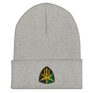 May include: Gray beanie with a green, blue, and yellow embroidered patch featuring a trident and lightning bolts.