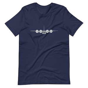 May include: A navy blue t-shirt with a white silhouette of a cargo plane with four propellers.