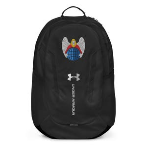 May include: Black Under Armour backpack with a silver logo and a white embroidered angel holding a globe. The angel has red and yellow accents.