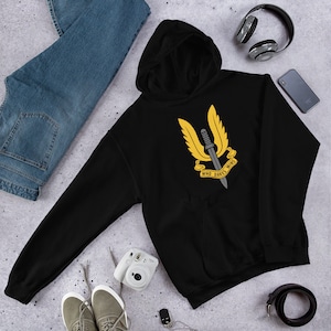May include: Black hooded sweatshirt with a yellow winged dagger graphic and the text "Who Dares Wins".