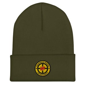 May include: Olive green beanie with a folded brim. The beanie features a circular patch with the words "KILLSTREAK MASTER" and "UNTOUCHABLE" around a target design in yellow and red.