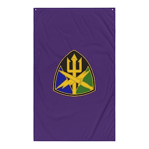 May include: Purple flag featuring a central emblem with a trident, lightning bolt, and sword design. The emblem is set against a black, blue, and green background. The flag is rectangular and has a grommet at the top for hanging.