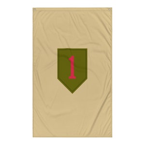 May include: A beige fabric flag with a green diamond-shaped patch featuring a red number "1" in the center. The patch has a black outline.