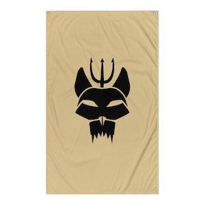 May include: A tan fabric flag featuring a black silhouette of a wolf's head with a trident on top. The wolf's head has a mask over its eyes and a set of sharp teeth.