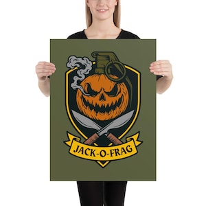 May include: A poster featuring a Halloween-themed design. The artwork includes an orange pumpkin with a menacing face, a grenade top, and crossed knives. The text "JACK-O-FRAG" is displayed on a banner below the pumpkin.