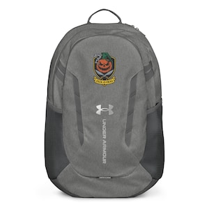 May include: Grey Under Armour backpack featuring a pumpkin-themed logo that reads "Jack-O-Frag." The backpack has a top handle, side mesh pockets, and the Under Armour logo. The backpack is designed for everyday use.