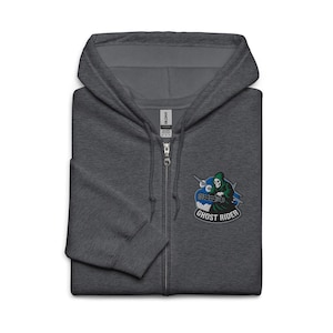 May include: A charcoal gray zip-up hoodie with a hood and a small embroidered patch. The patch features a cartoon grim reaper riding a motorcycle, with the words "GHOST RIDER" in a circular design.