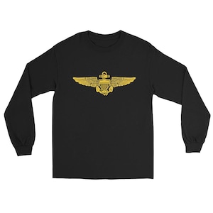 May include: Black long-sleeve shirt featuring a gold-colored aviation emblem on the front. The emblem includes wings, a shield, and a central element. The shirt is made of a soft material.