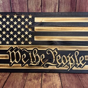 Rustic black burnt “We the People” flag. Custom made Buy with confidence fast shipping.