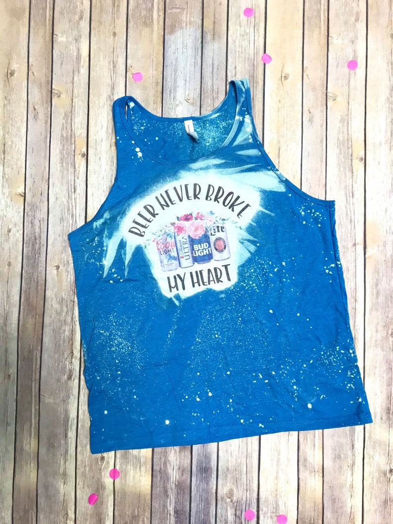 A \u201c Beer never broke my heart\u201d blue Bella Canvas tank top